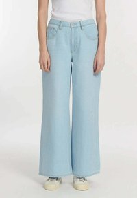 Lichtblauwe wide-leg jeans van denim, met een hoge taille, voorzakken en een losse pasvorm die aan de onderkant uitloopt.