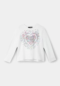 White long-sleeve t-shirt featuring a glittery heart design in multiple colors, with scattered dots and a round neckline.