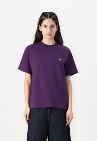 Purple cotton t-shirt with a relaxed fit, round neckline, short sleeves, and small embroidered logo in orange and yellow on the chest.