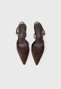 Brown suede slingback heels with pointed toes, thin adjustable straps, and a smooth, dark interior. No visible hardware or embellishments.
