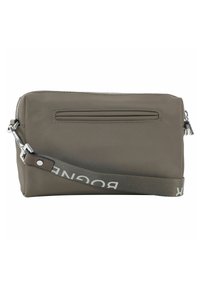 Olivnozeleni crossbody nahrbtnik iz najlona, z glavnim predelkom na zadrgo, sprednjim žepom in nastavljivim pasom z logotipom.