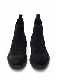 Sinih villa ankle boots, joissa on joustavat sivupaneelit, pyöreä varvas, huomaamaton rei'itys, ja musta kumipohja.