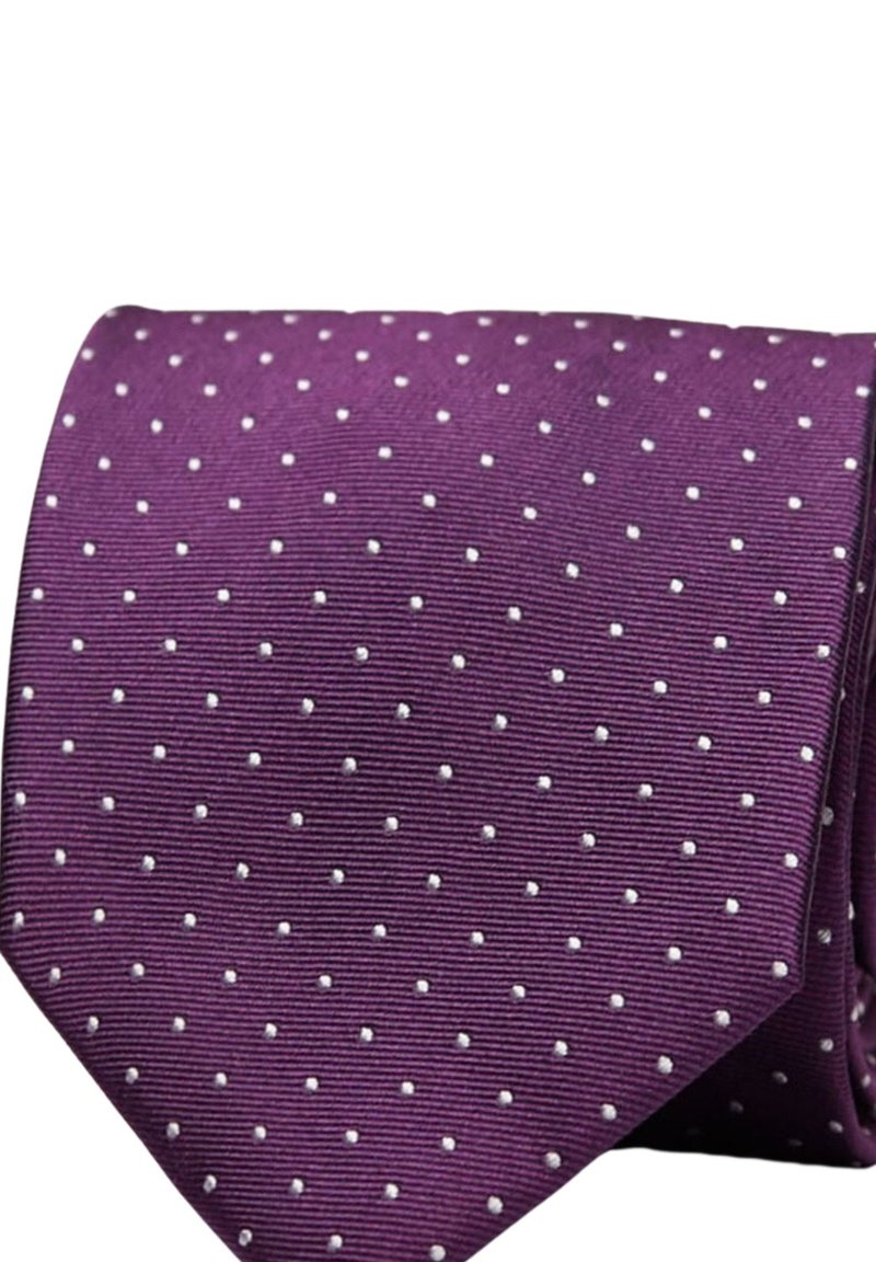 Lila slips med vita prickar, med en texturerad tyg och en spetsig topp. Designen är jämnt fördelad över ytan.