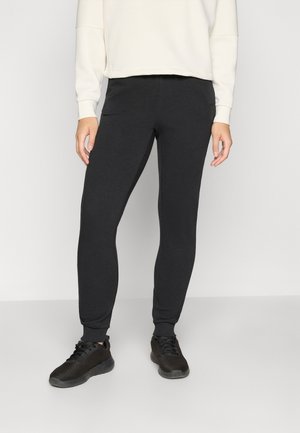 Svart, tapered joggebukser laget av mykt materiale med en glatt tekstur, med elastisk midjebånd og mansjetter for komfort.