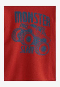 Sélectionné, rust red monster truck