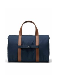 Sac de sport bleu marine avec des poignées et des accents en cuir marron, présentant une finition texturée et une sangle avant avec un fermoir à bouton-pression.