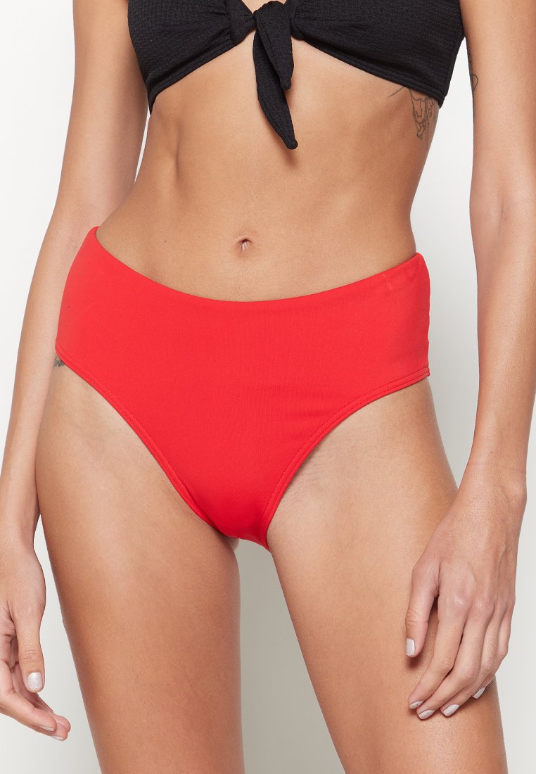 Triumph Slip rood