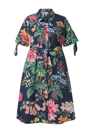 Marineblauwe jurk met knopen, korte mouwen, bloemenprint in roze, oranje, groen en blauw, met een ceintuur en strikjes aan de mouwen.