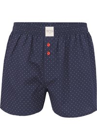 Boxers en coton bleu marine avec des pois blancs, dotés d'une braguette à boutons avec des boutons rouges et d'une taille élastique pour plus de confort.
