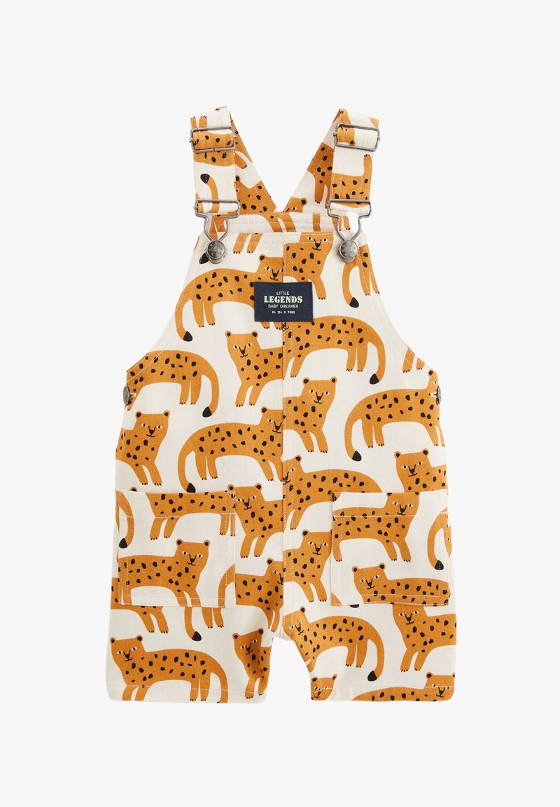 Salopette jaune et crème avec un motif léopard, dotée de bretelles réglables, de quincaillerie en métal et de deux poches avant.