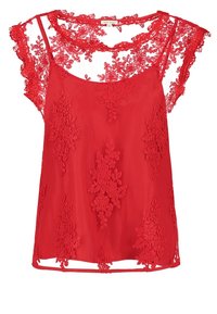 Rød ærmeløs bluse med et gennemsigtigt blondeoverlæg med blomsterbroderi, bølgede kanter og en afslappet pasform.
