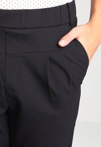 Culture Tygbyxor - black