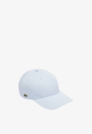 Casquette de baseball bleu clair en coton, dotée d'une visière incurvée et d'un logo de crocodile vert brodé à l'avant. Six trous de ventilation.