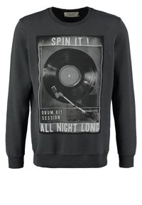 Sweat-shirt gris foncé avec un graphisme vintage de disque vinyle et de cellule, texte « SPIN IT! DRUM KIT SESSION ALL NIGHT LONG » sur le devant.