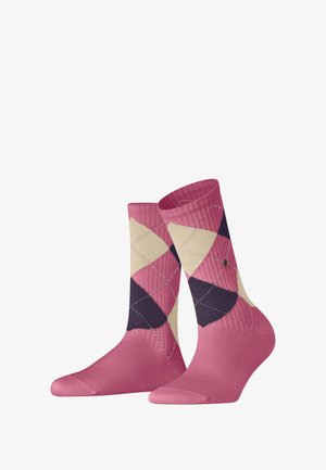 Pink argyle socks with a ribbed texture, featuring cream and dark purple diamond patterns, and a small logo accent on the side.