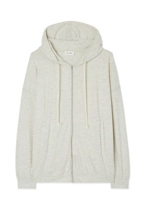 Lys grå zip-up hoodie med et blødt, tekstureret stof, snøre i huen og frontlommer. Har løse ærmer og et afslappet design.