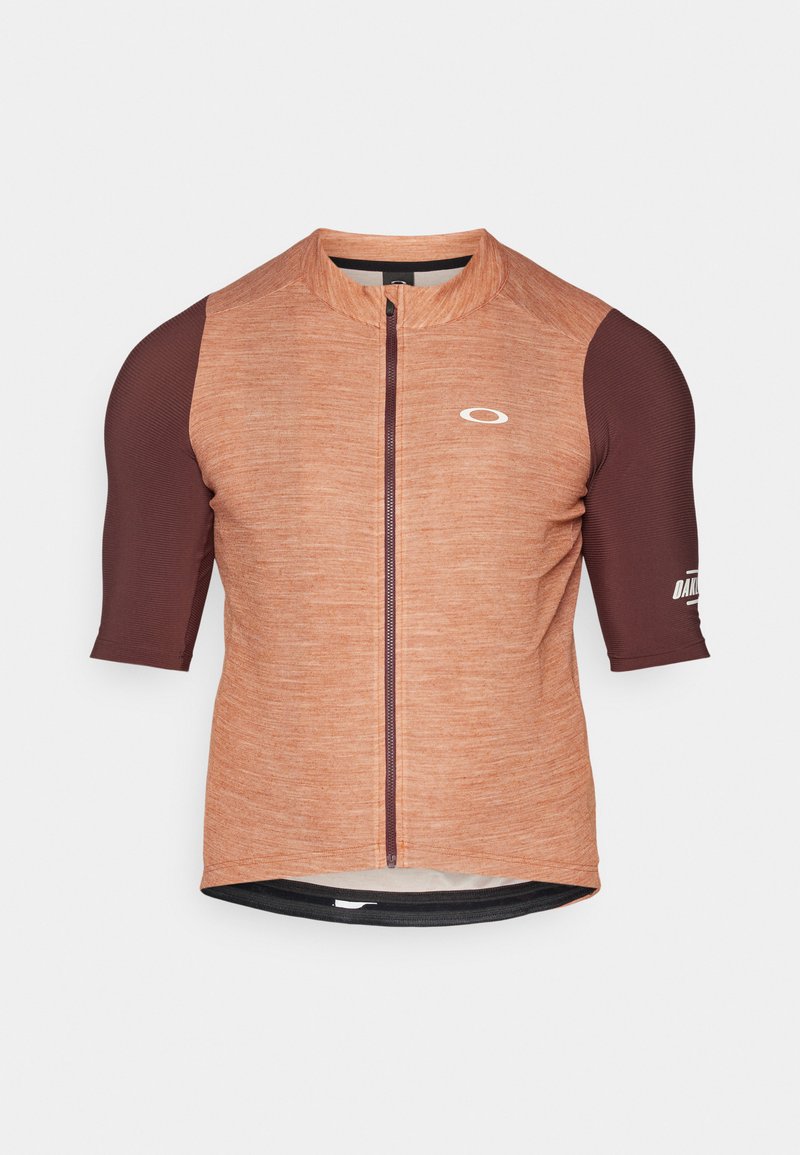 Maglia da ciclismo a maniche corte in arancione e marrone scuro. Tessuto textured con zip anteriore e logo sulla manica. Vestibilità atletica e fluida.