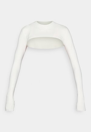 Top blanco de manga larga con cuello redondo, que presenta un corte rectangular en el pecho, fabricado en una tela lisa y elástica.