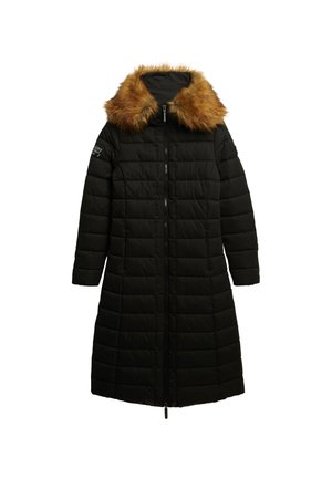 Lange zwarte pufferjas met een nepbont, bruin kraag. Heeft een rits aan de voorkant, een gestikt patroon en lange mouwen.