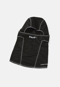 Zwarte balaclava gemaakt van gaasstof, met witte stiksels en het "huf" logo aan de voorkant. Ergonomische vorm met openingen voor het gezicht.