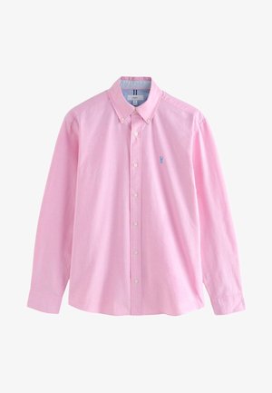 Lichtroze overhemd met lange mouwen en knopen, voorzien van een kraag. Heeft een klein blauw logo op de borst en een gestructureerde stof.