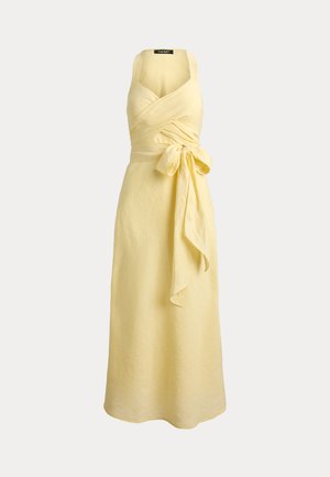 Hihaton vaaleankeltainen midi-mittainen mekko, jossa on kietaisumallinen yläosa, leveät olkaimet ja suuri solmittu rusetti vyötäröllä.