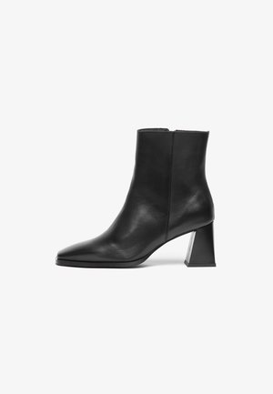Black leather ankle boot with a pointed toe, a medium geometric heel, and a smooth texture. Simple design with no visible hardware or accents.