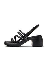Black sandal with multiple thin straps, a rounded toe, and a chunky, textured heel. Adjustable ankle strap for secure fit.