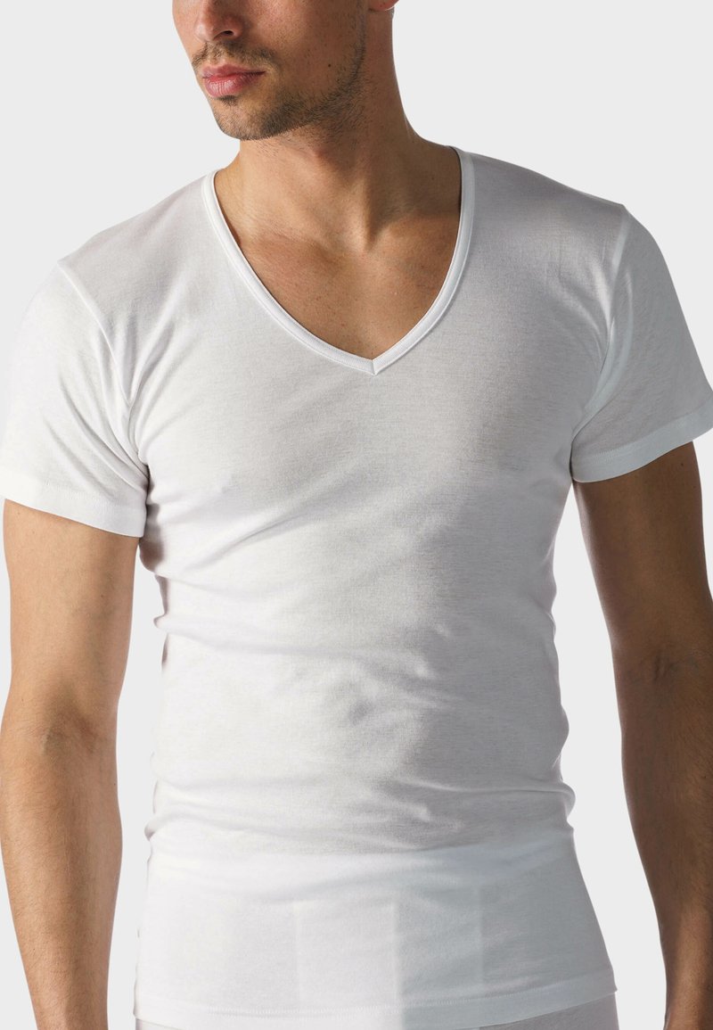 White cotton V-neck t-shirt with short sleeves, fitted design, smooth texture, and a simple, clean silhouette.