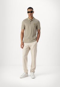 Lyle & Scott Polo - sage uniform