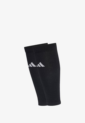 Calze sportive nere con una texture liscia, con un logo Adidas bianco in un motivo diagonale. Realizzate in materiale a maglia elasticizzata.