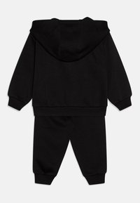 Nike Sportswear CLUB UNISEX SET - Lukuga pusa - black
