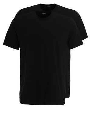 T-shirts en coton noir, col rond, manches courtes, coupe décontractée. Deux t-shirts empilés, texture lisse, sans motifs ni graphiques visibles.