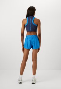 Under Armour TECH PLAY UP - Sports shorts - blue atlantis/washed navy