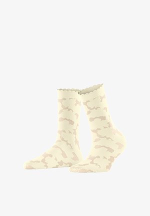 Chaussettes courtes couleur crème avec un bord festonné et un motif abstrait beige subtil.