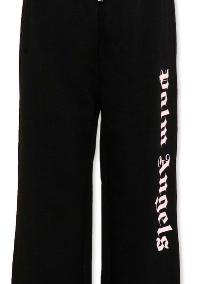 Pantalon de survêtement noir avec un texte "Palm Angels" de style gothique rose courant verticalement le long de la jambe droite.