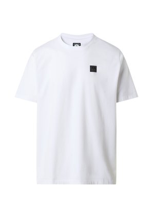 T-shirt bianca in cotone con maniche corte, scollatura a girocollo e una piccola toppa nera con il logo sull'area sinistra del petto.