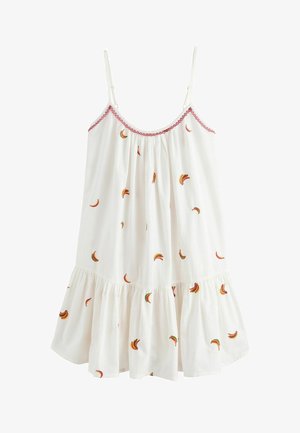 Valkoinen hihaton mekko, jossa ohuet olkaimet, vaaleanpunainen reunus pääntiessä ja pieniä monivärisiä banaanin muotoisia kirjailuja kankaan pinnalla.