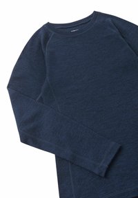 Navy blue long-sleeve crew neck shirt made of soft, textured fabric with visible seam stitching on sleeves and body.
