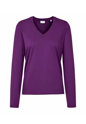 Langärmliges V-Ausschnitt-Oberteil in einfarbigem Lila. Hergestellt aus weichem, leichtem Stoff. Verfügt über eine entspannte Passform und dezente Nahtdetails am Ausschnitt.