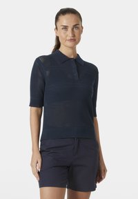 Námořnické polo tričko s kr átkým rukávem, s texturovaným, otevřeným pleteným vzorem a zapínáním na tři knoflíky. Žebrovaný lem a manžety, v kombinaci s námořnickými šortkami.
