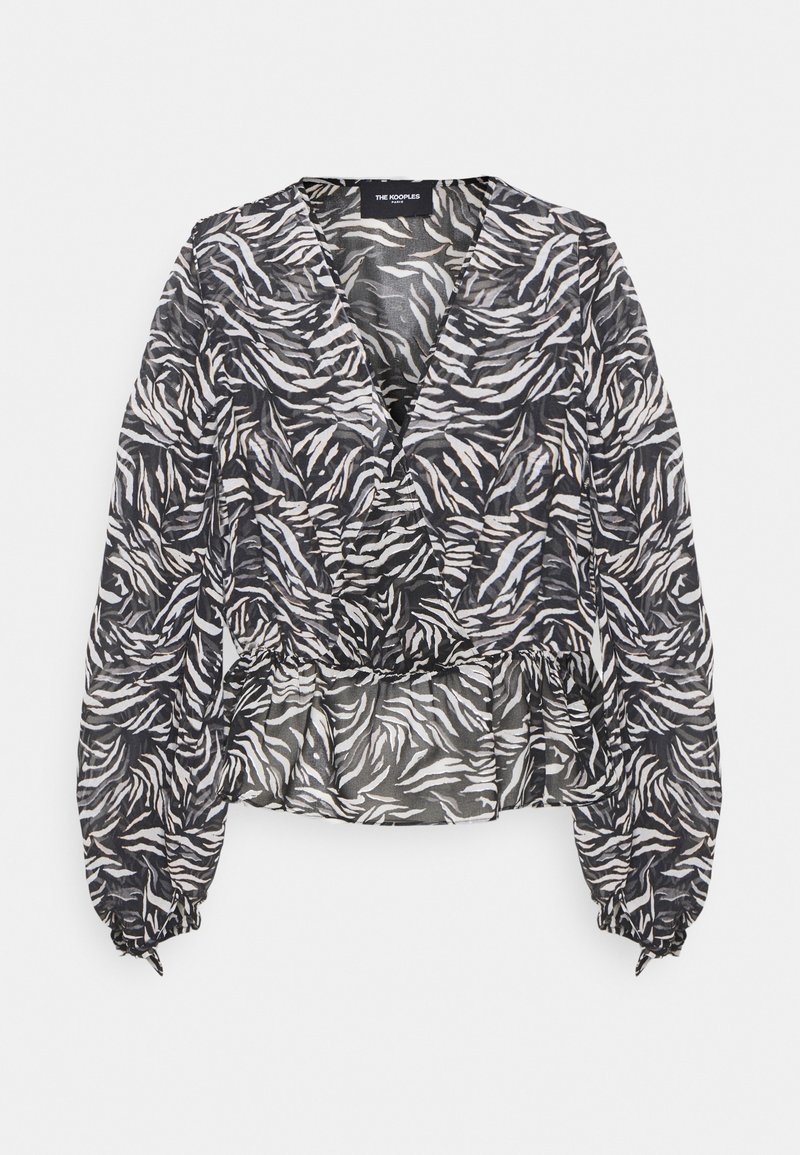 Blouse à manches longues à imprimé zèbre en noir et blanc avec col en V, taille élastique et poignets froncés de The Kooples.