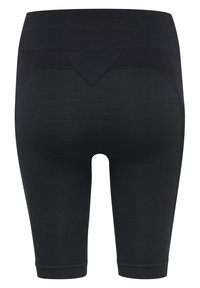 Shorts de compression noirs sans coutures à taille haute avec un gousset texturé et un ourlet côtelé, conçus pour un usage sportif ou décontracté.