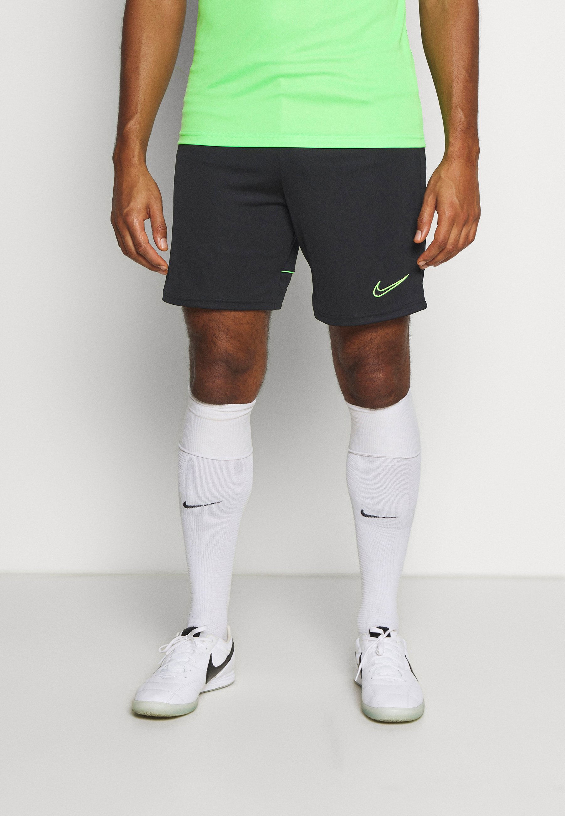 nike shorts black green 