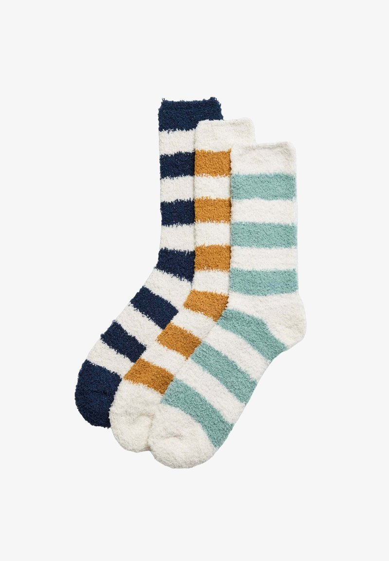 Tres pares de calcetines a rayas: azul marino y blanco, mostaza y blanco, teal y blanco. Textura suave y peluda, longitud hasta la mitad de la pantorrilla, punteras redondeadas.