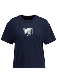 Námořnické bavlněné tričko s krátkým rukávem a kulatým výstřihem. Na přední straně se nachází bílé vyšívané nápisy "TOMMY" a "JEANS".