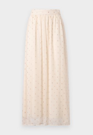 Light beige maxi skirt made of sheer fabric, featuring gold dot embroidery and an elastic waistband, with a flowy design and soft texture.