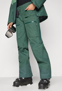 Norrøna LOFOTEN INSULATED PANTS - Lyžařské kalhoty - jungle green