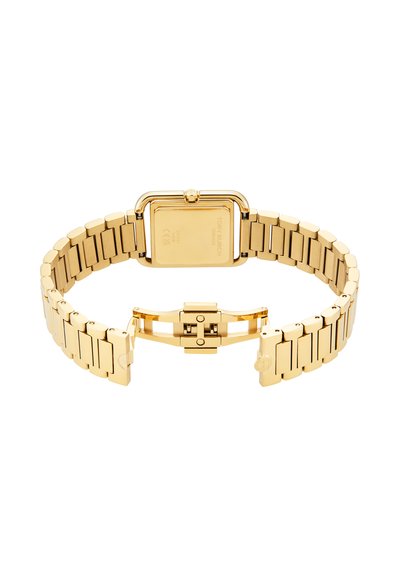 Gold-tone metal wristwatch band with rectangular case back and open butterfly clasp, shown from the back on a white background.