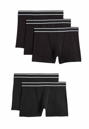 Twee sets zwarte herenboxers met witte gestreepte elastische taillebanden, elk set bestaande uit drie paar, weergegeven op een witte achtergrond.